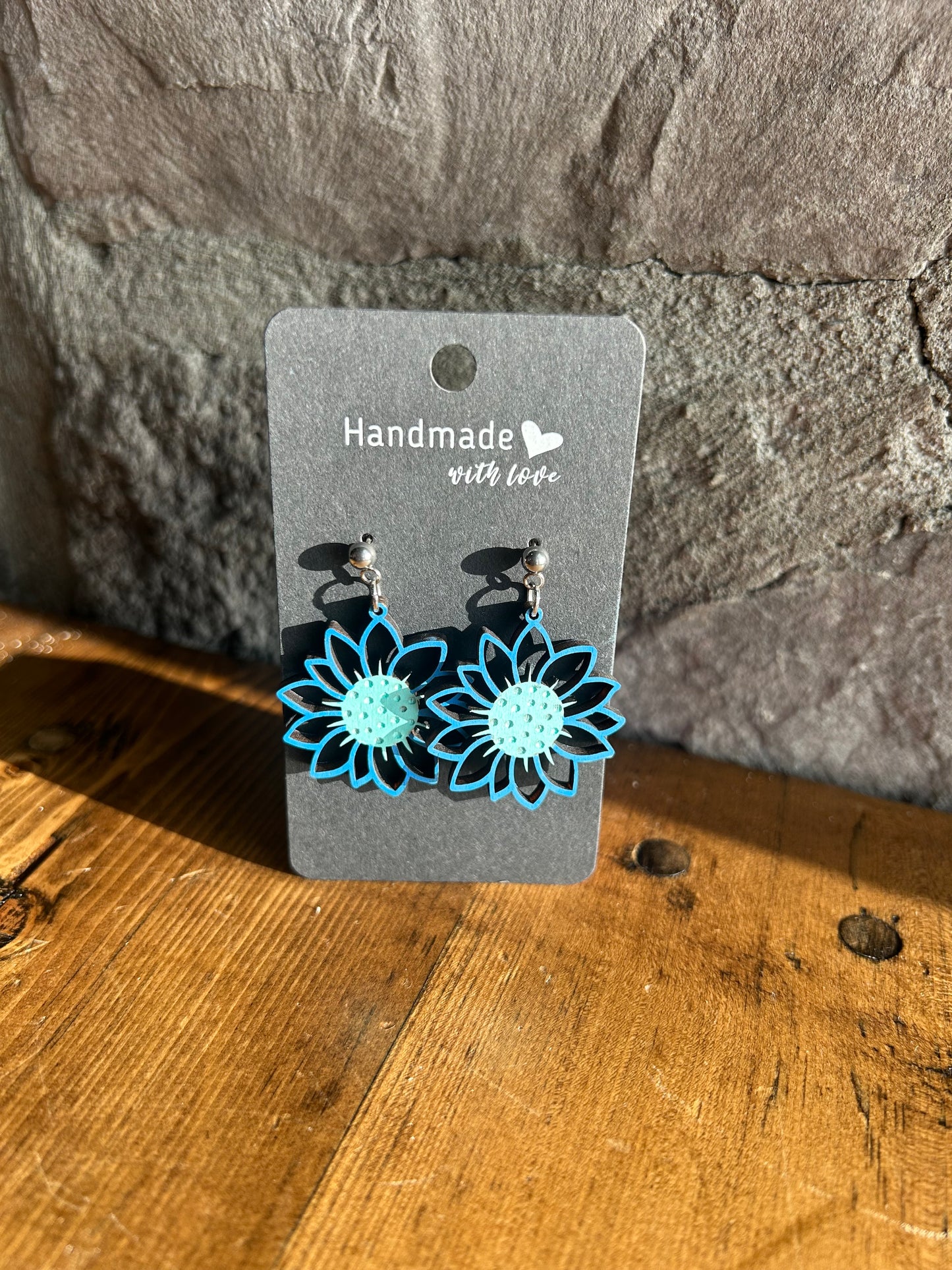 Blue flower cut out earring