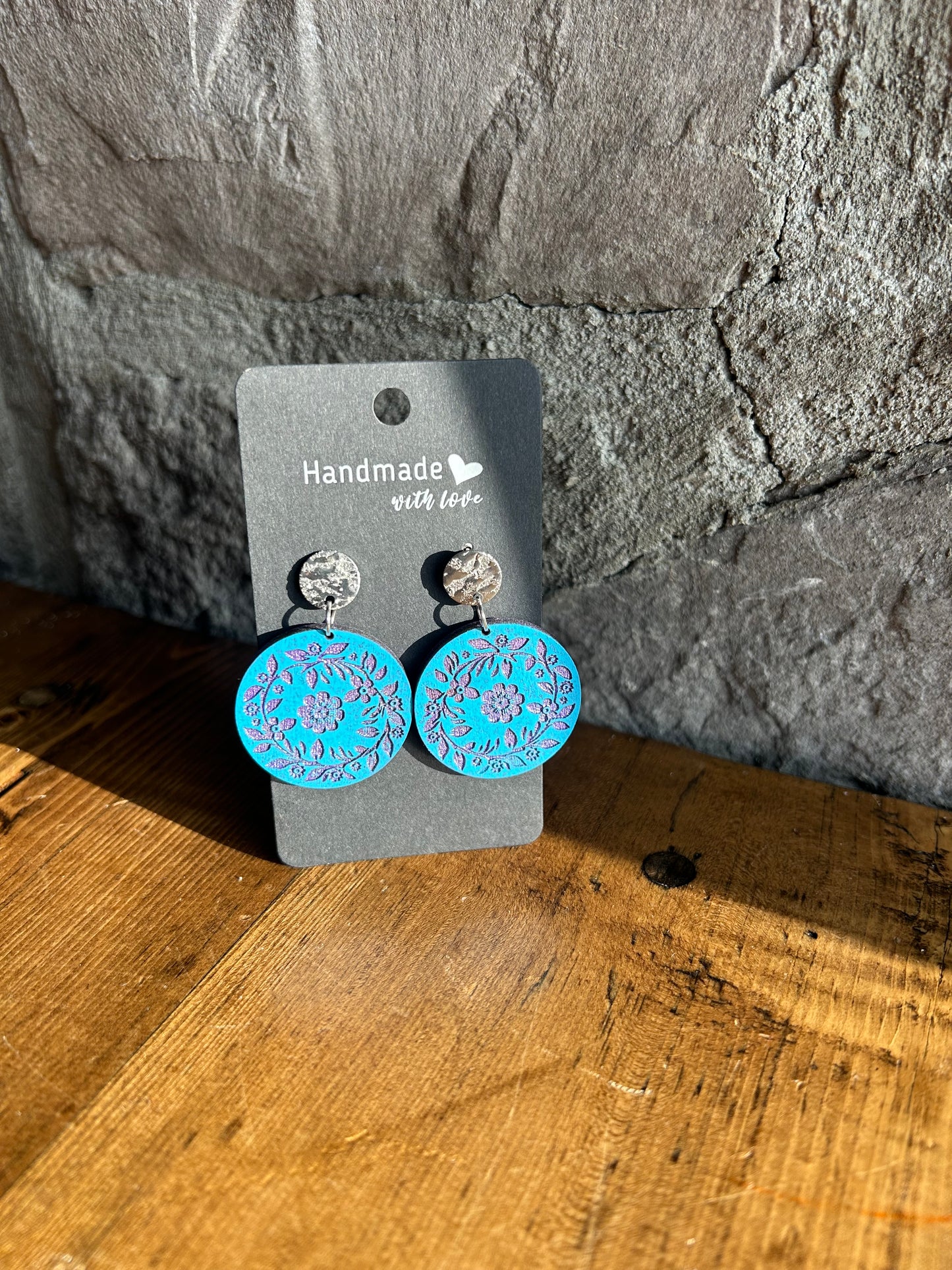 Round blue flower earrings