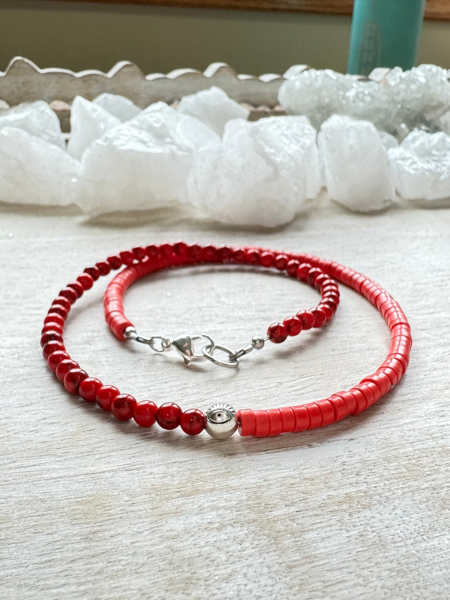 Coral and dyed howlite necklace