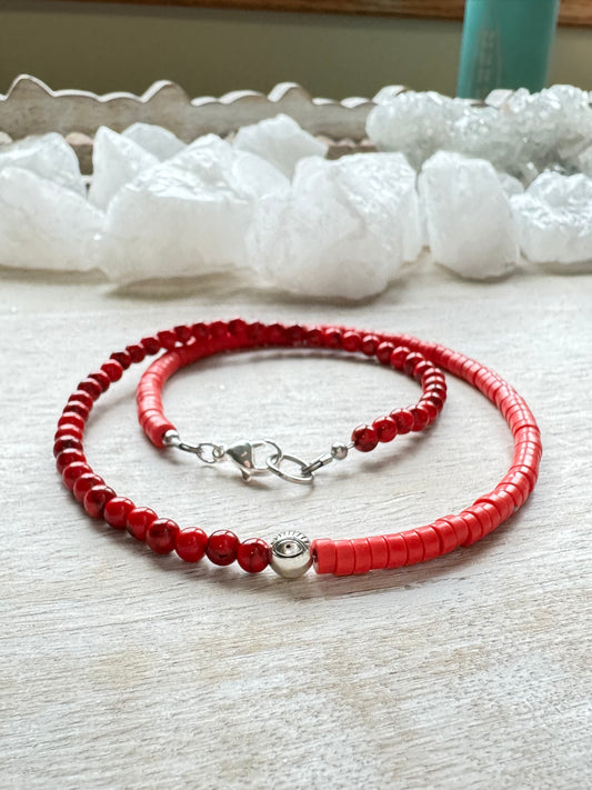 Coral and dyed howlite necklace