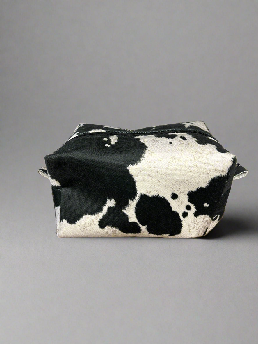 Cowhide look zippered pouch bag