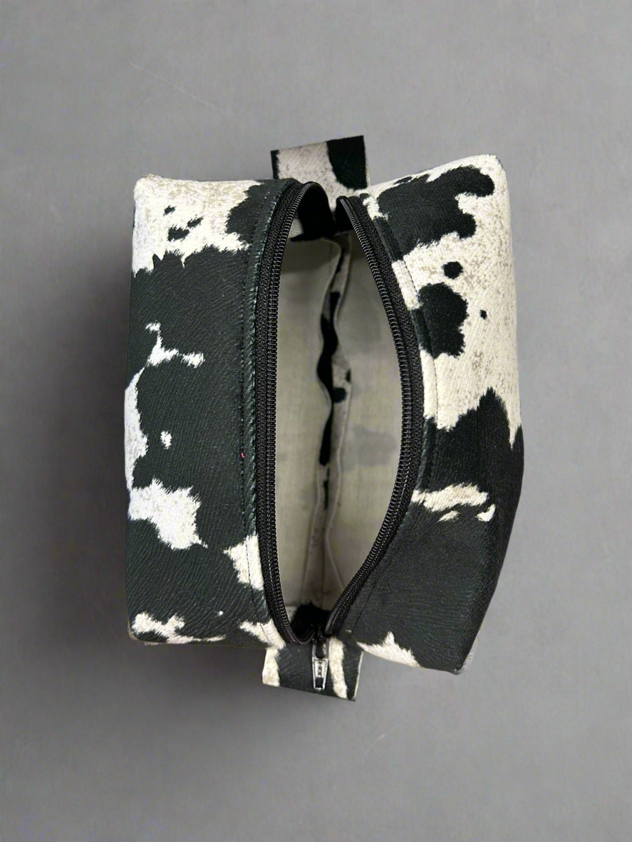 Cowhide look zippered pouch bag