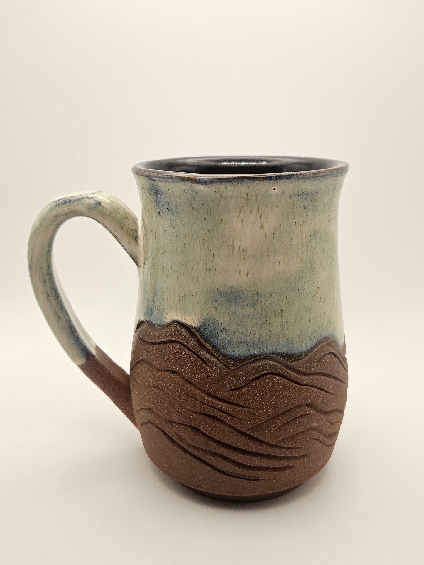 Red Clay Mountain Carved Mug